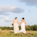 Same-sex couple photoshoot in wedding dresses